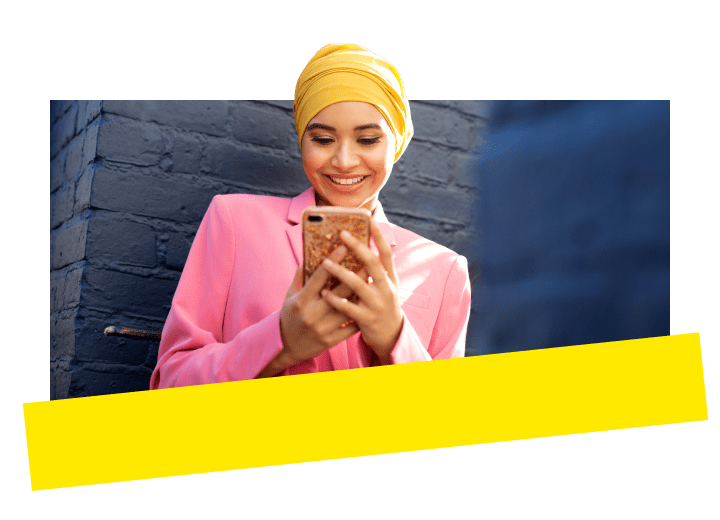Young professional using GoTo Connect to connect with customers while on their mobile device.