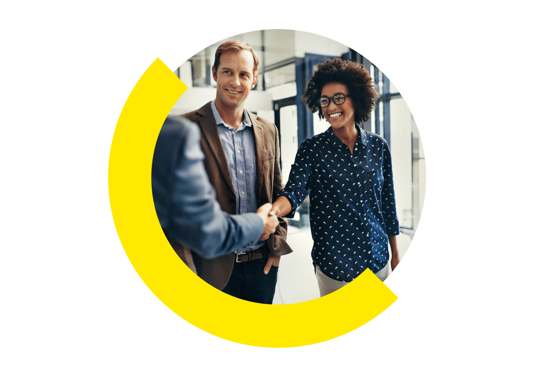 A happy customer meeting a sales agent at a car dealership.